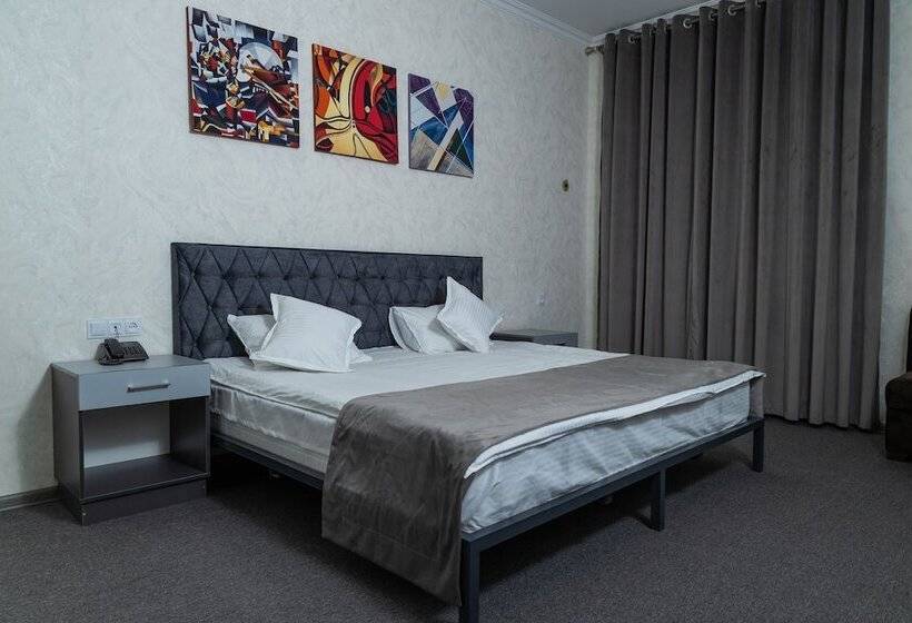 Habitació Deluxe, The Time