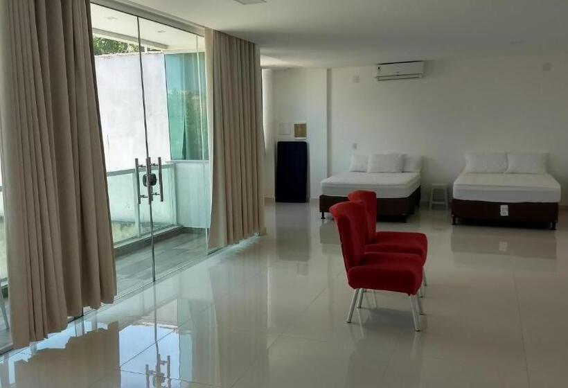 חדר לארבעה סטנדרטי עם מרפסת, Suítes Cabo Frio