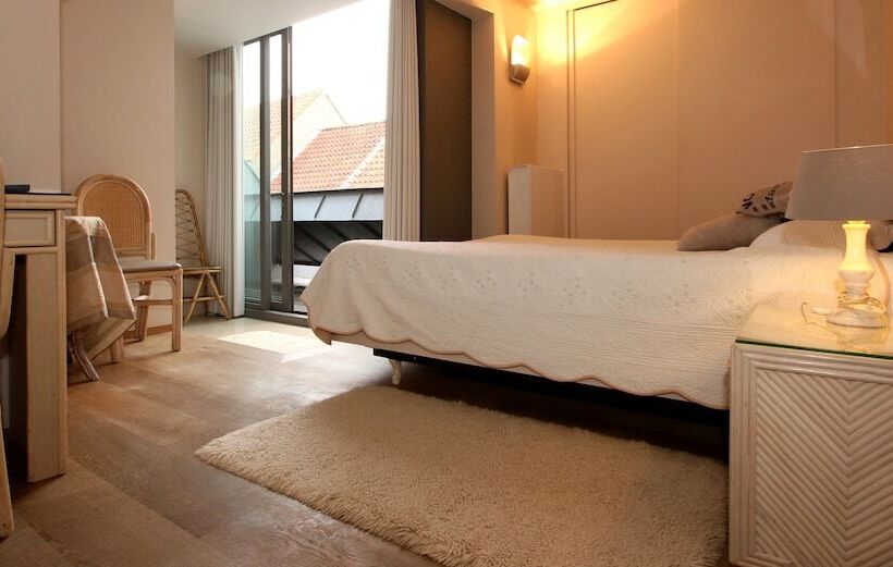 غرفة ديلوكس, T Walleke