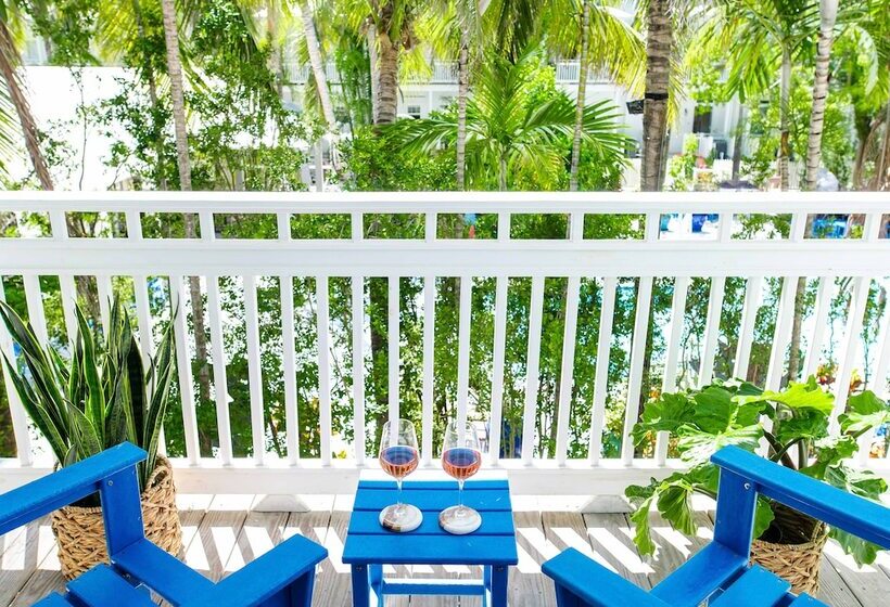 מיטת קינג בסוויטה, Parrot Key Hotel & Villas