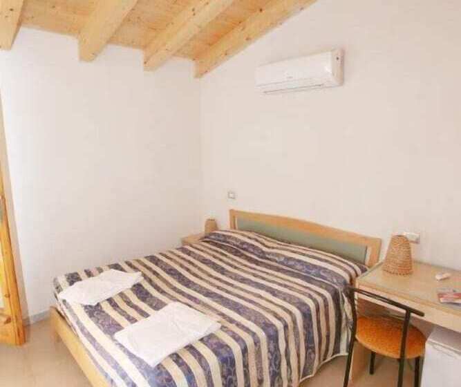 غرفة قياسية ثلاثية, Paola