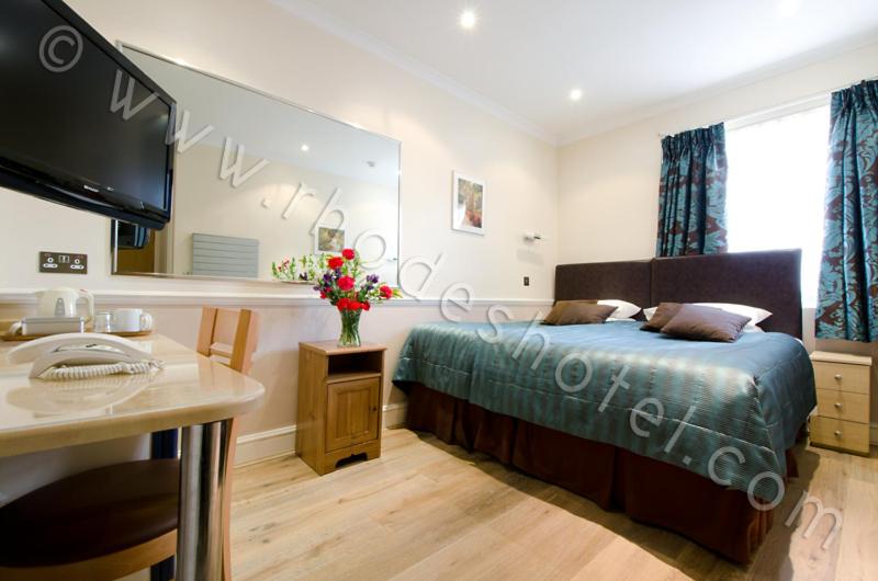 Номер Стандарт, Rhodes