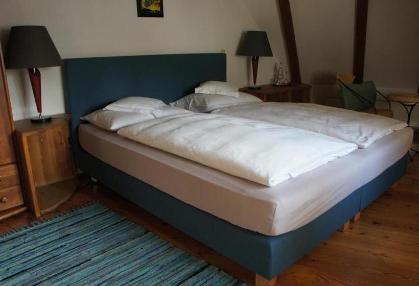 Quarto Estandar Cama King, Schwarzer Adler