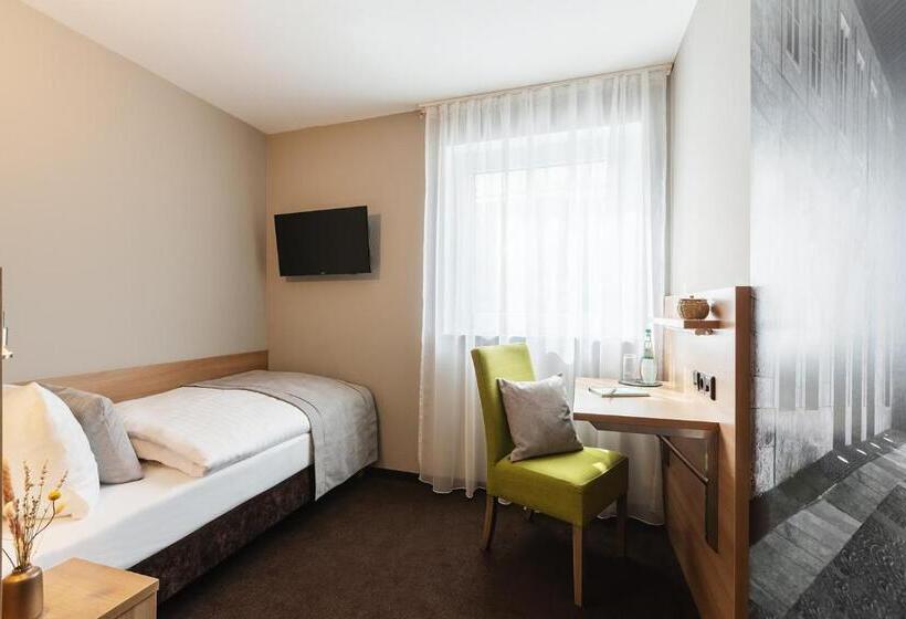 غرفة قياسية فردية, Novum Hotel Bruy