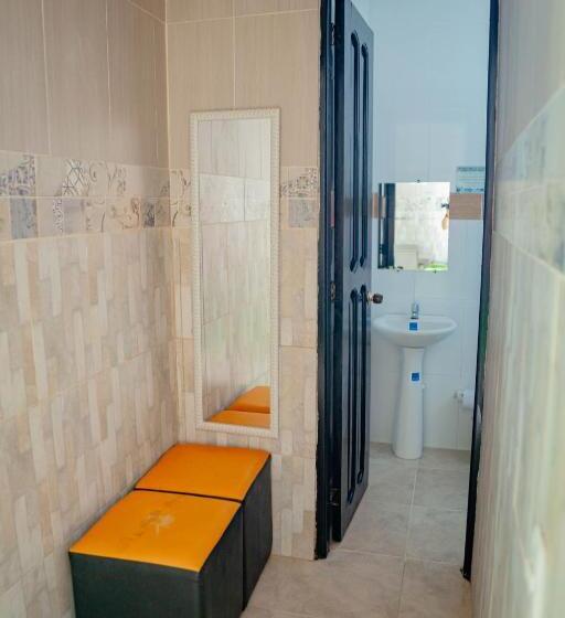 דירת חדר, Caribbean Town Tolu