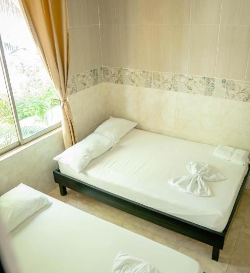 דירת חדר, Caribbean Town Tolu