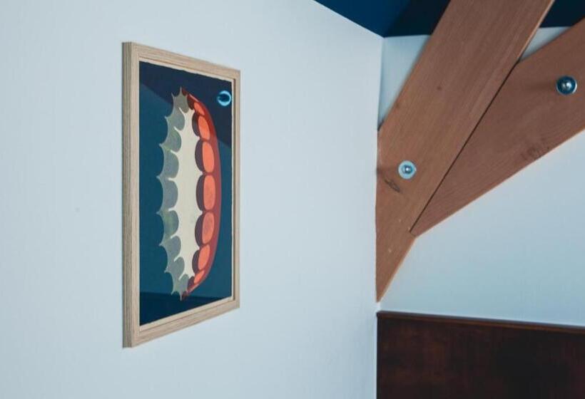 Quarto superior, Café Koophandel