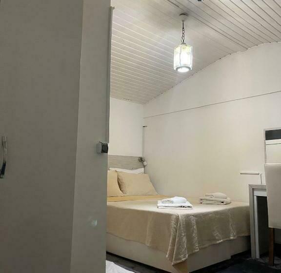 Quarto standart vista jardim, Moy Side