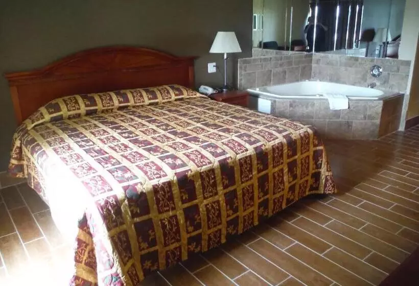 キングサイズベッドのスタンダードルーム, Budgetel Inn & Suites
