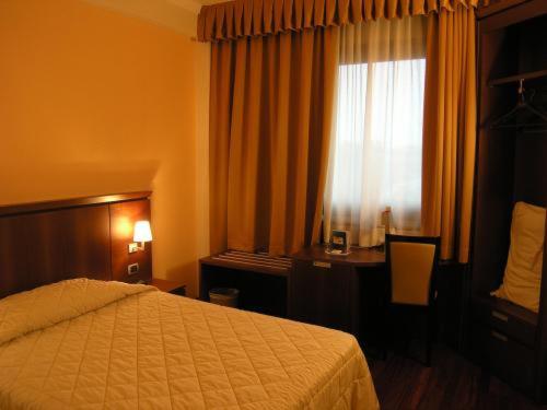 ダブルベッドのスタンダードシングルルーム, Dado Hotel International