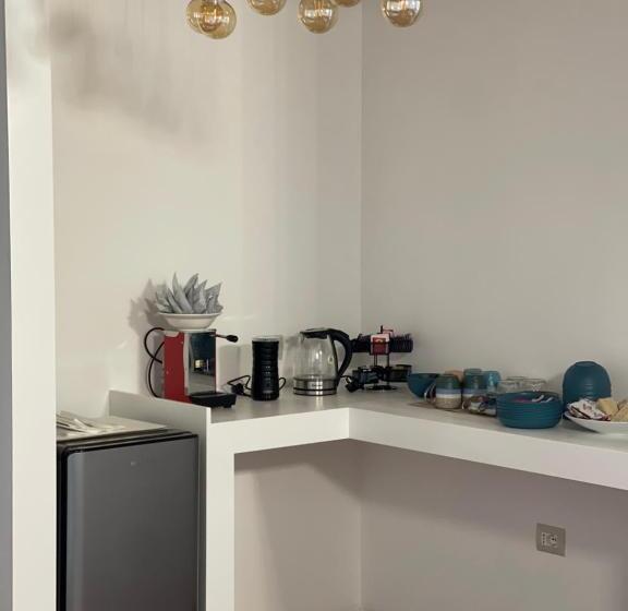 חדר משפחתי דלוקס, Mela E Pera