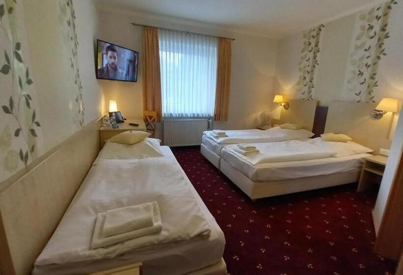 Quarto Triplo Estandar, Kräuterhotel & Restaurant Heidejäger