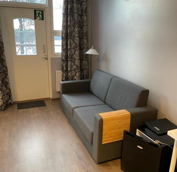 غرفة عائلية, Lapin Satu