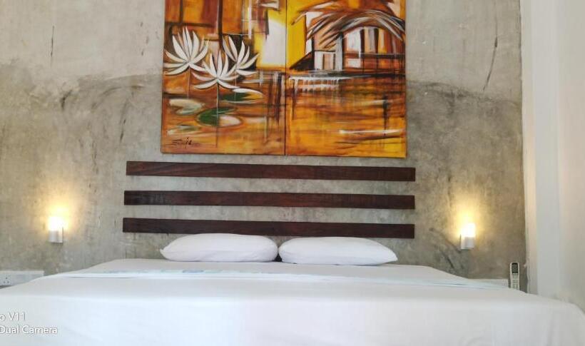 اتاق استاندارد با چشم‌انداز باغ, Petit Guest House
