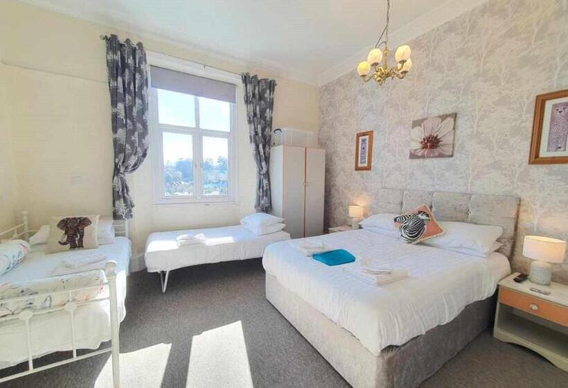 اتاق خانوادگی با چشمانداز باغ, The Purple Tree Guest House