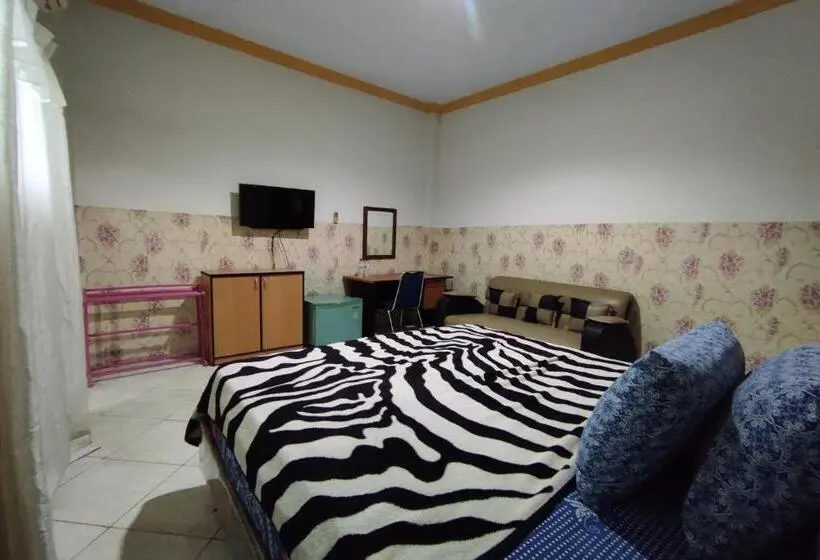 デラックスルーム, Capital O 91650 Hotel Pratama