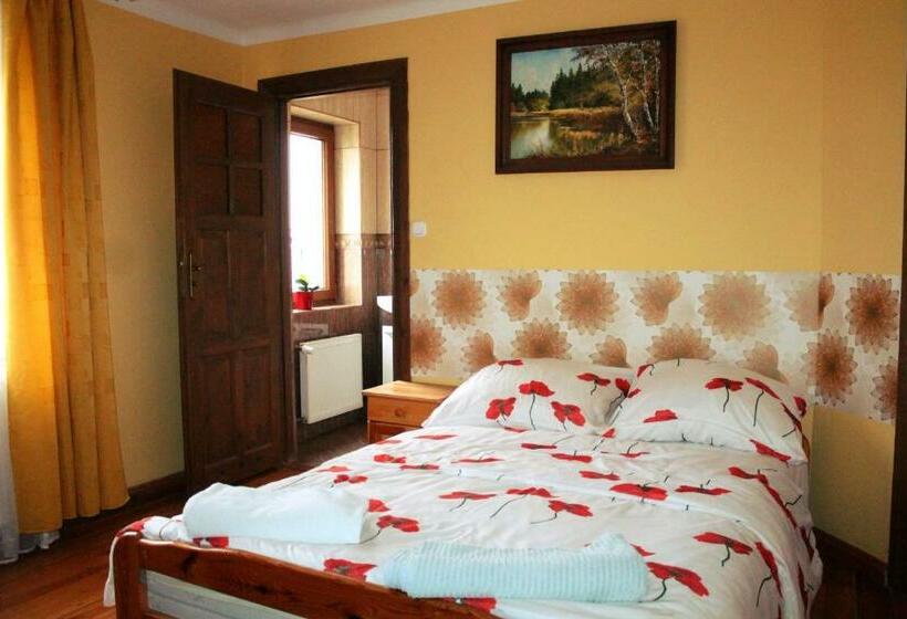 חדר משפחתי, Dom Nad Rozlewiskiem