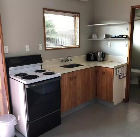 Huoneisto 1 Makuuhuone Pohjakerros, Lilybrook Motel
