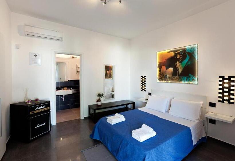 Quarto Deluxe, Bed & Blues