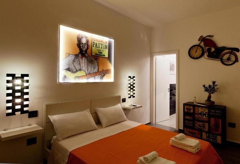 Quarto Deluxe, Bed & Blues