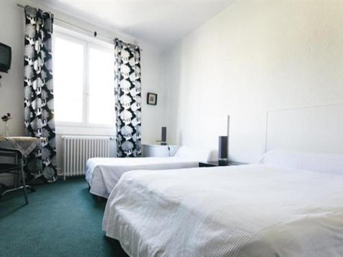 غرفة قياسية ثلاثية, Hôtel Restaurant Le Lion D Or