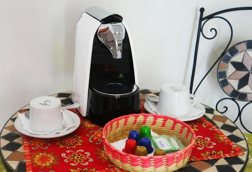 מיטת קינג בסוויטה, Merida Santiago Hotel Boutique
