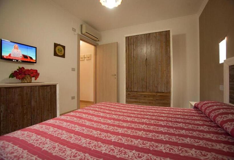 آپارتمان یک خوابه با دری مشترک که هال را جدا می کند., Masseria Tenuta Specolizzi