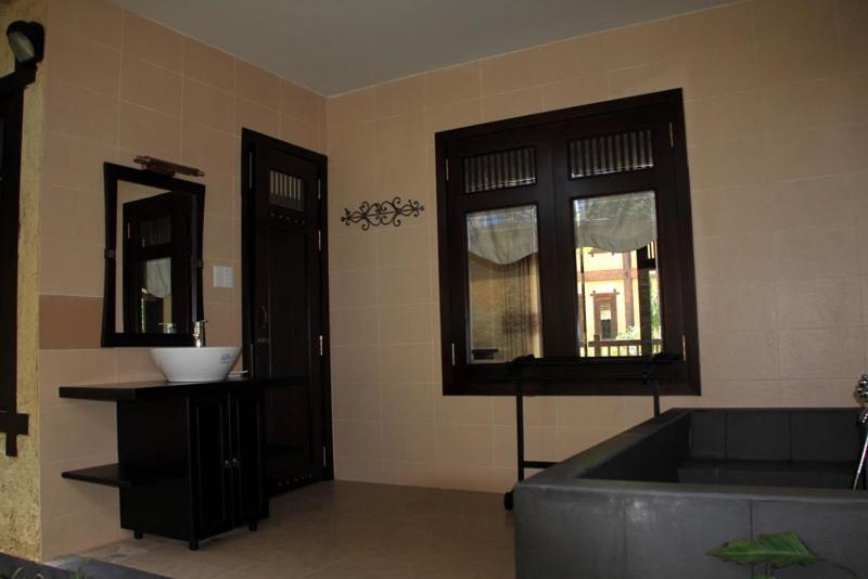 اتاق لوکس با چشم‌انداز باغ, Lotus Village Resort