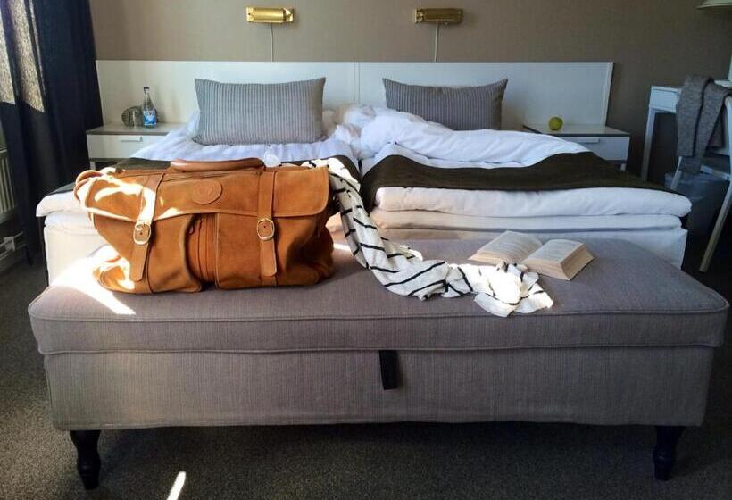 标准间, L Garvaren