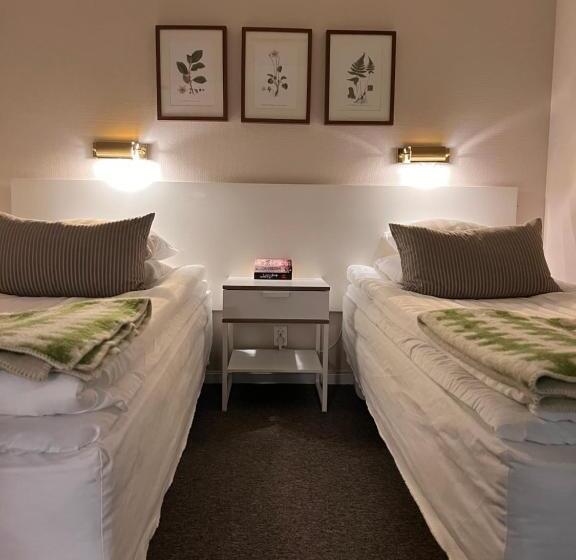 家庭间, L Garvaren