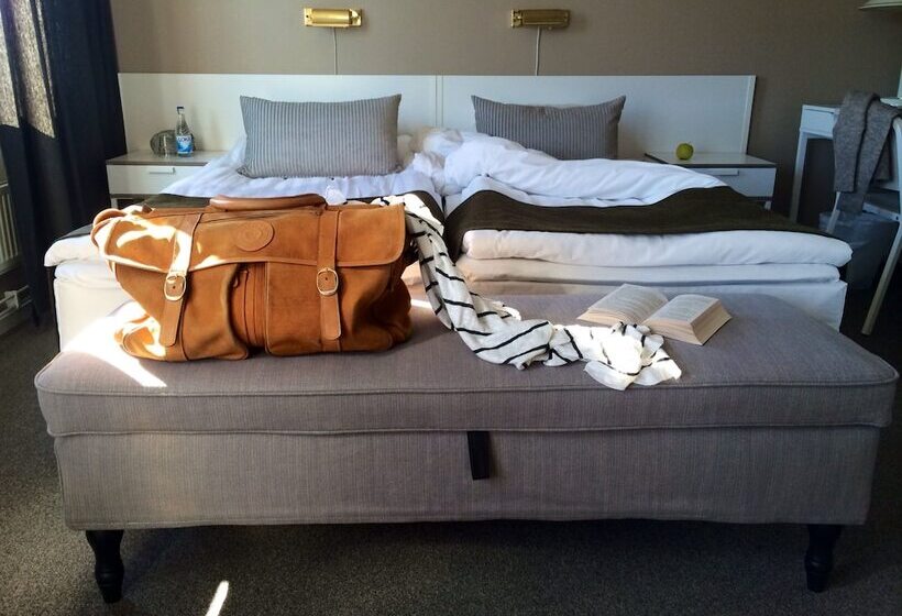 标准间, L Garvaren