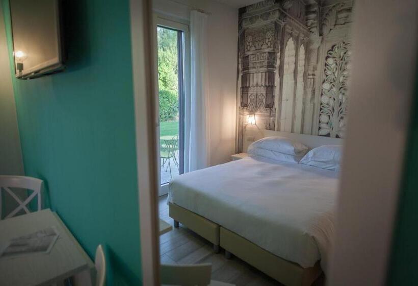 חדר משפחתי נוף לגינה, Arli Hotel Hideaway Punta Ala   Adults Only