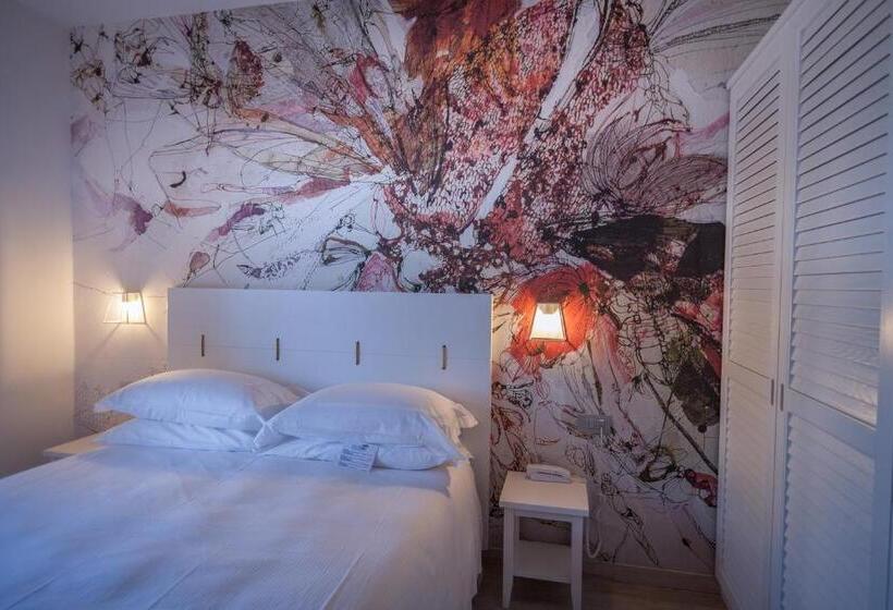 חדר משפחתי נוף לגינה, Arli Hotel Hideaway Punta Ala   Adults Only