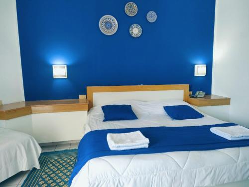 발코니가 있는 4인용 스탠다드 룸, Neptunia Skanes