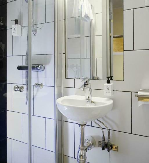 חדר מוזל מקלחת משותפת, Rex Petit