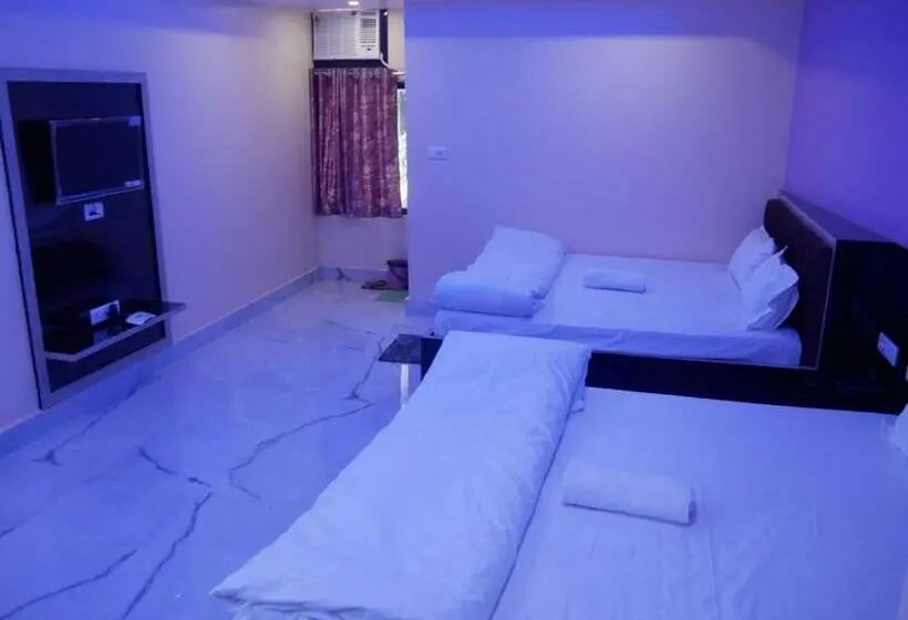 デラックスの4人部屋, Vaidehi Inn A Unit Of Vaidehi Guest House