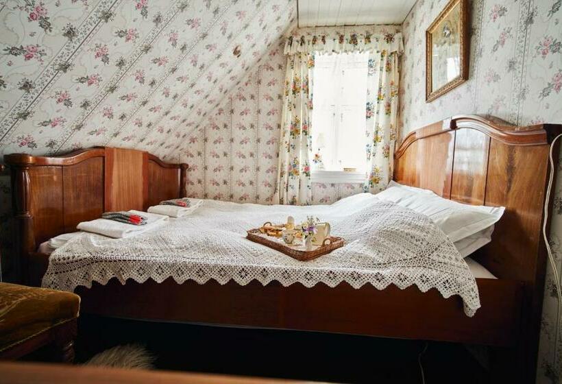 غرفة قياسية, Heima í Stovu