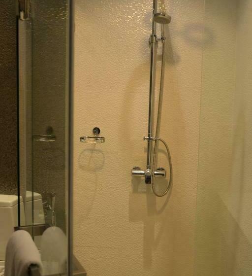 חדר דחוקס עם מיטת קינג, Sir James Resort