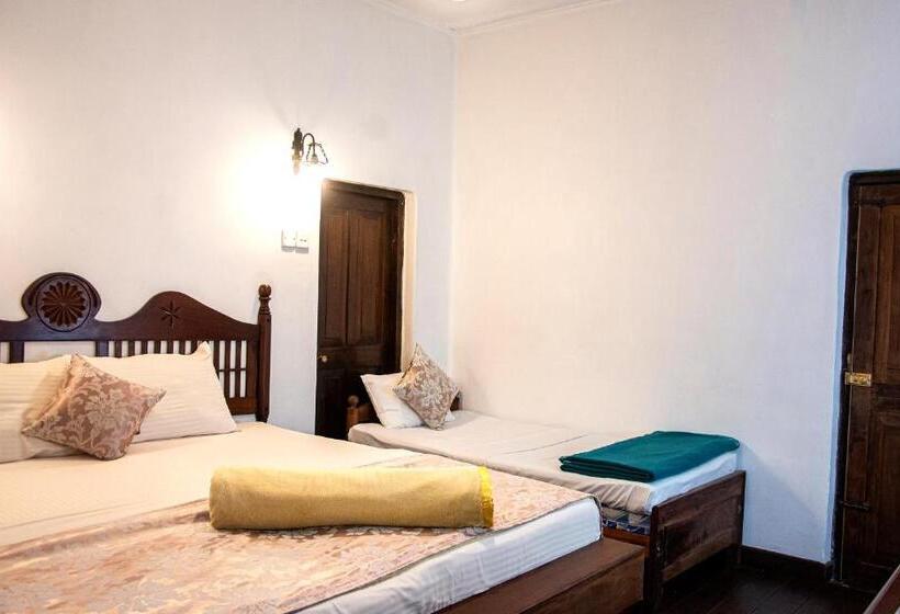 Quarto Triplo Deluxe, The Golf Green City Bungalow
