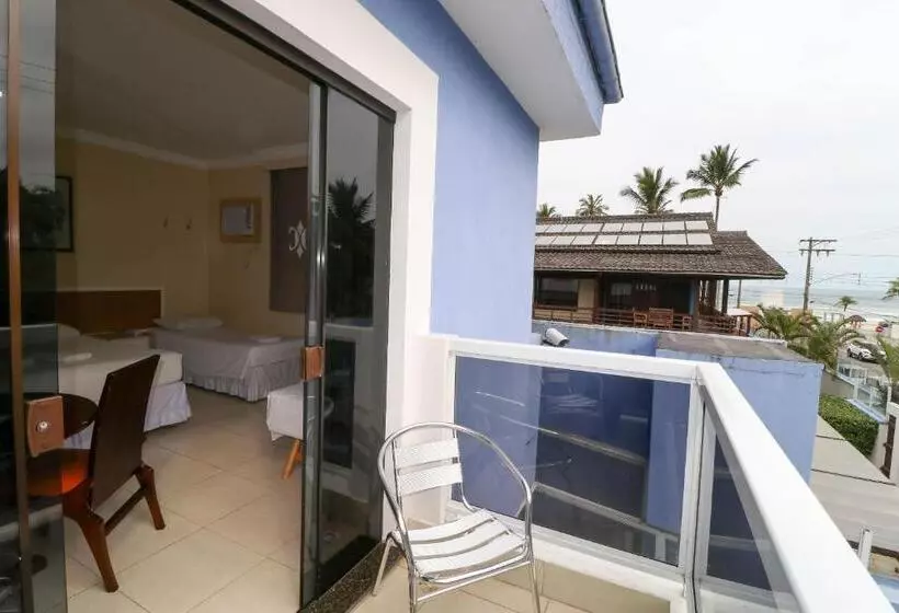 اتاق استاندارد چهارنفره با چشم‌انداز جانبی دریا, Charme Hotel Guarujá Frente Mar