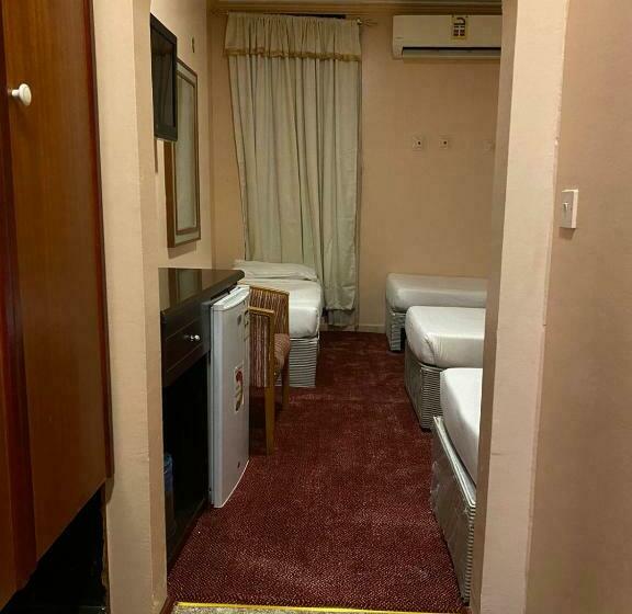 4인용 스탠다드 룸, فندق برج العالم