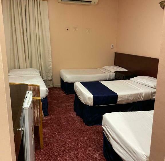 4인용 스탠다드 룸, فندق برج العالم