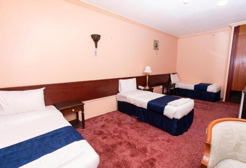 4인용 스탠다드 룸, فندق برج العالم