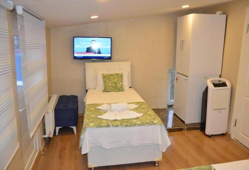 Quarto Triplo Estandar com Sacada, Işıl