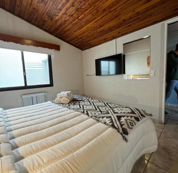 اتاق استاندارد چهارنفره با چشم‌انداز باغ, El Residencial B&b