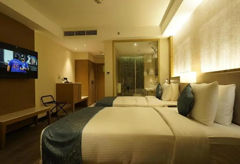 キングサイズベッドのスタンダードルーム, Gokulam Grand Trivandrum