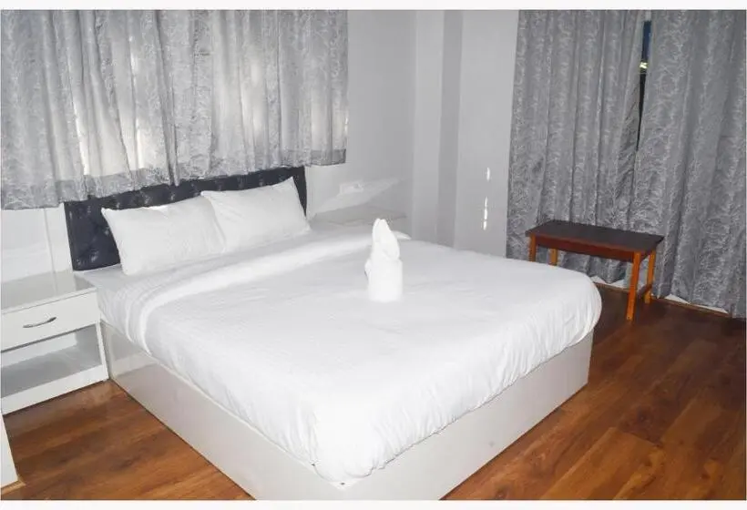 Habitació Triple Clàssica, Dug Inn