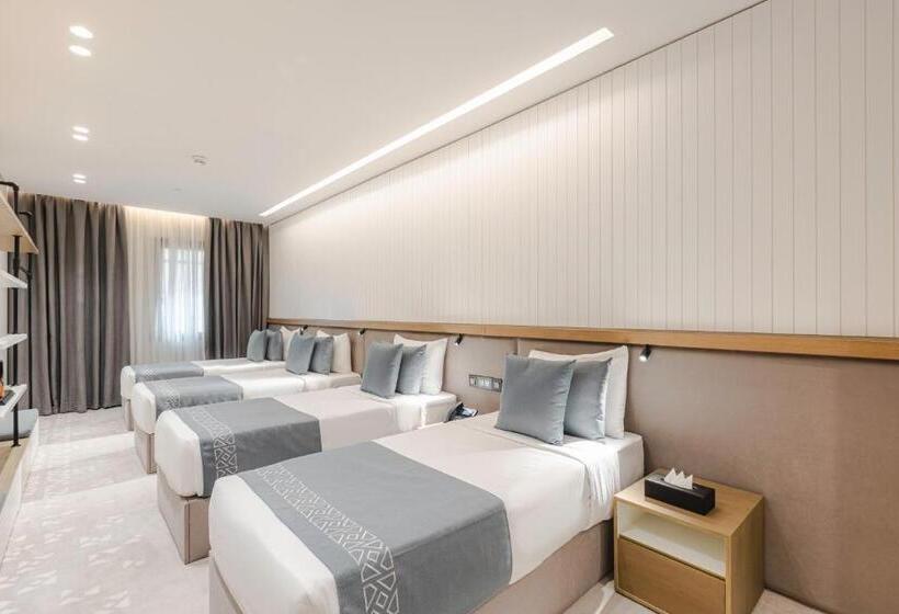 经典四人房间, Assaafa