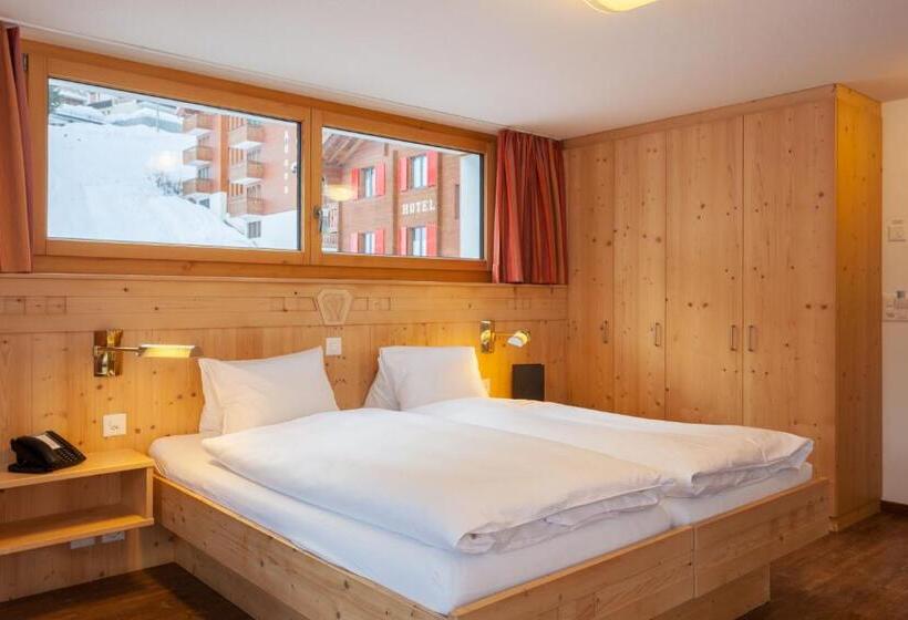 חדר דלוקס, Capricorn