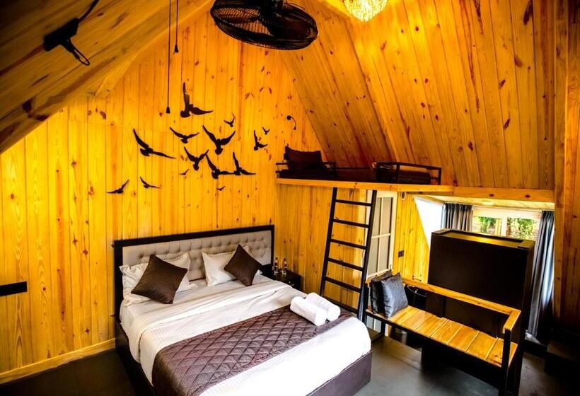 キングサイズベッドのスタンダードルーム, The Cove Lakkidi By Voye Homes
